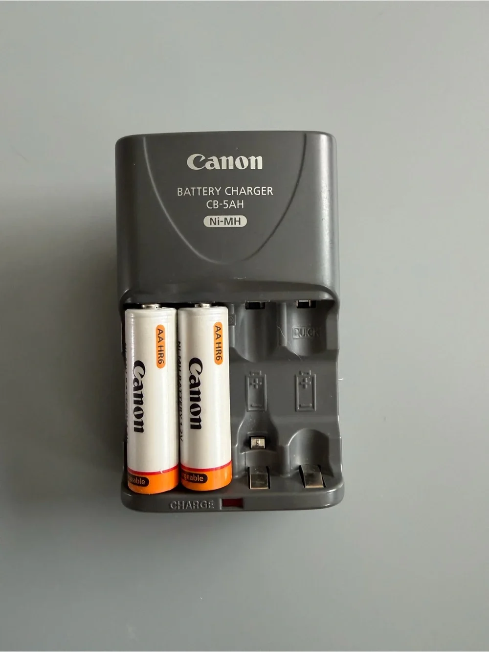 Canon includes charger